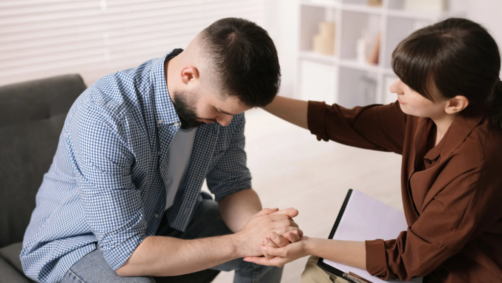 psychiatrist conducts a clinical interview